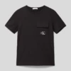 Calvin Klein Jeans T-Shirt Mit Label-Patch Modell 'BADGE' - Schwarz 1 Calvin Klein Jeans T-Shirt Mit Label-Patch Modell 'BADGE' - Schwarz -Beliebt Bekleidungsgeschäft 6t94sd9la51jgji38d95aiq46cpjigi4716kml2g84pk4e2c8la56ihm994k6jhp8go5ci2a8h6k2gho8go68dhh6pi3cc3460rmcc1k74sjee1j69ijcc1jcop66p9n61im6c8