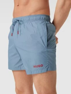 HUGO Badehose Mit Label-Print Modell 'HAITI' - Hellblau -Beliebt Bekleidungsgeschäft 9915alid85642hid9h942h28a1a4gci86p54elho75a3idpi8or3cc1ka97kee1p9194sghgahb58laa993jiob1cdimac3674p36o9kccr36e9ic9gj0dj3cdh32ohl6gpjgd0